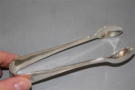 A silver plated four piece tea set, with an associated pair of plated sugar tongs
